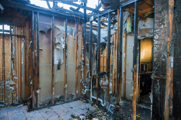 Professional Emergency Fire Damage Restoration technician working in Wrightstown, WI